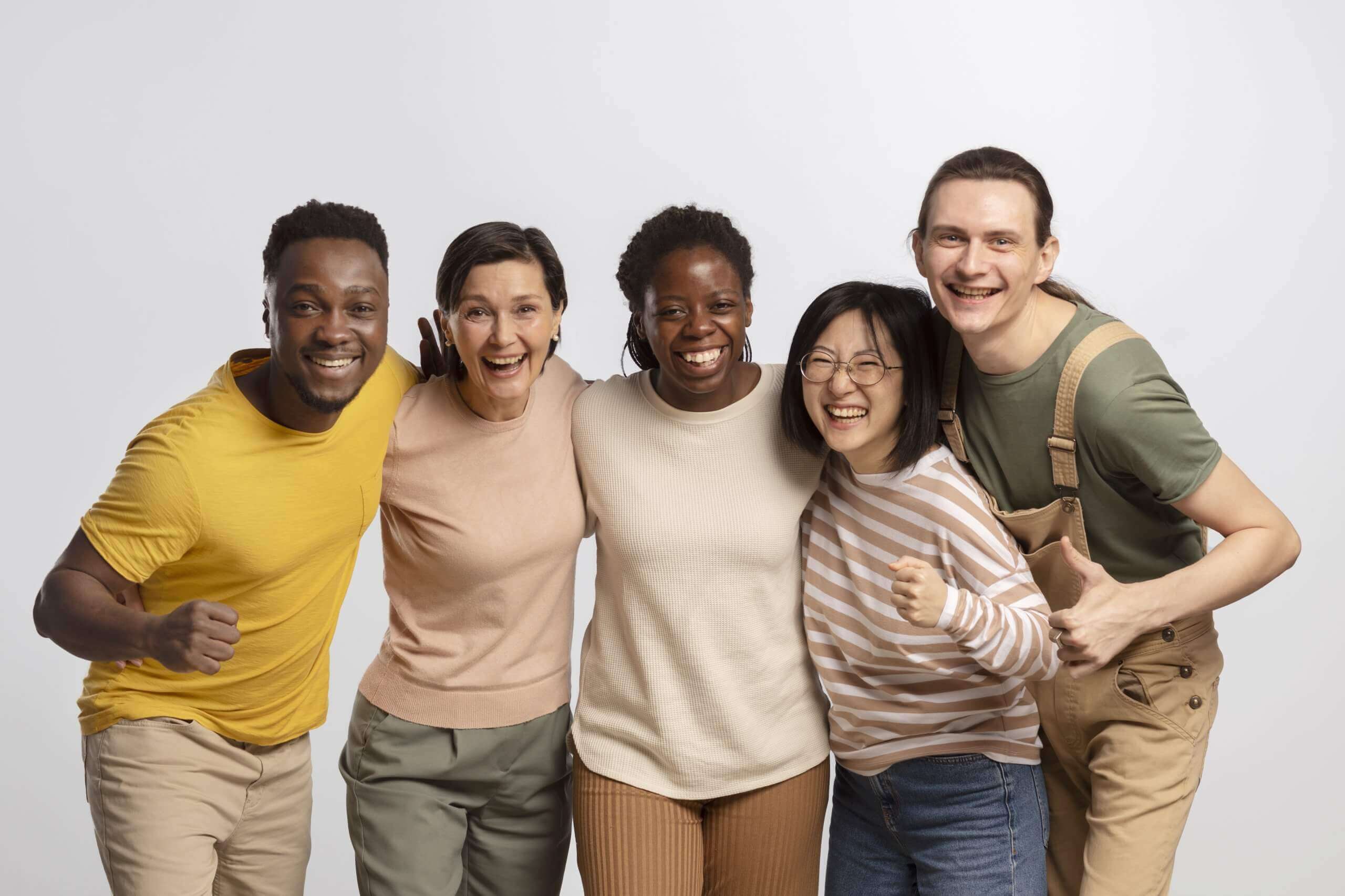 group of friends standing arm in arm